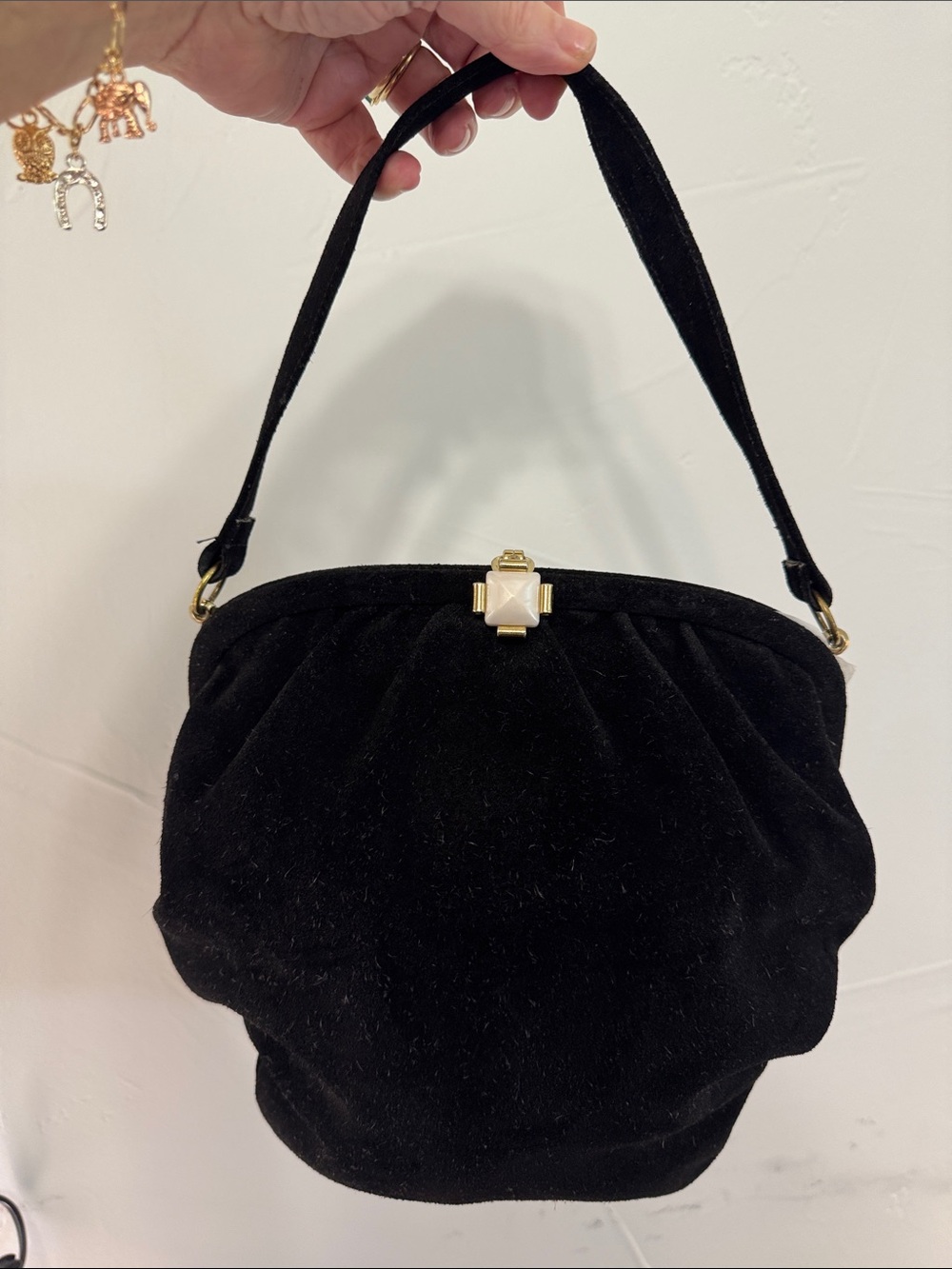 Vintage black suede shoulder bag with snap top decoration